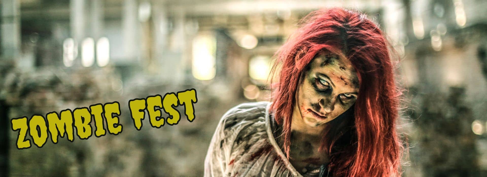 zombie with red hair in front of blurred city background with text “zombie fest”